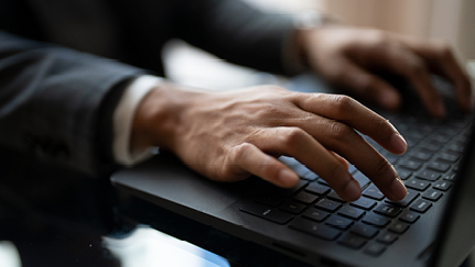 hands on a keyboard